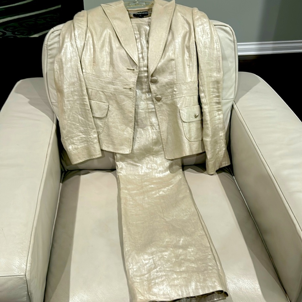 This is a Tahari beige set.